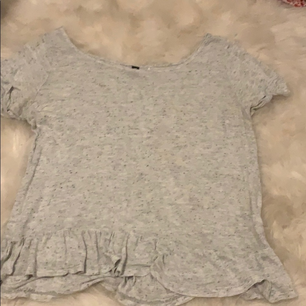 A nice flowy shirt with black specks.